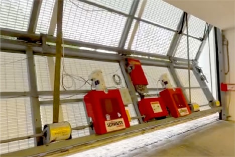 Schweiss bifold door installed on parking garage at Four Seasons Hotel Miami shown opening from inside