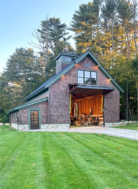 Schweiss bifold door installed on Greg Webb's boat barn shown open