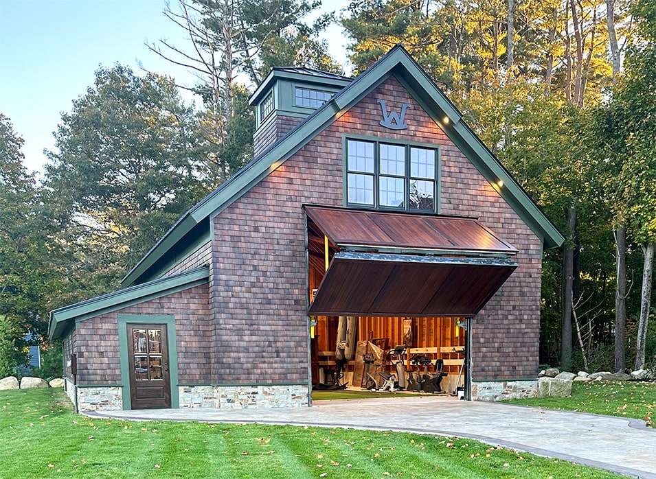 Schweiss bifold door installed on Greg Webb's boat barn shown opening