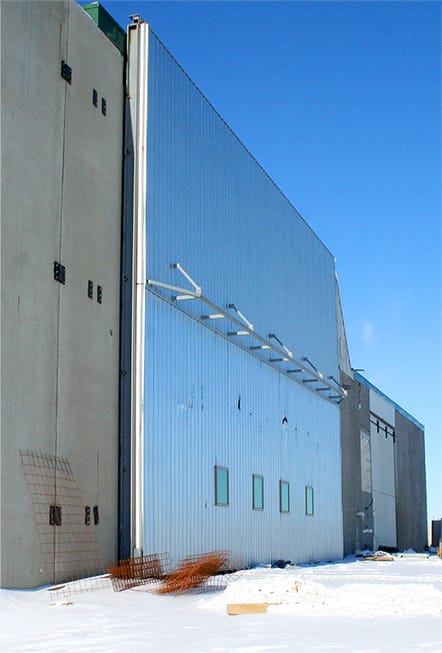 Angled view of Schweiss bifold door fitted on Hanson Silo shown in the closed position