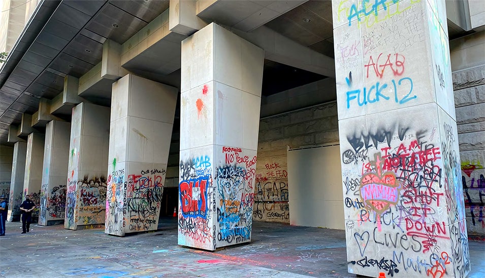 Hatfield Courthouse with damage prior to the recent renovations, graffiti covering the pillars