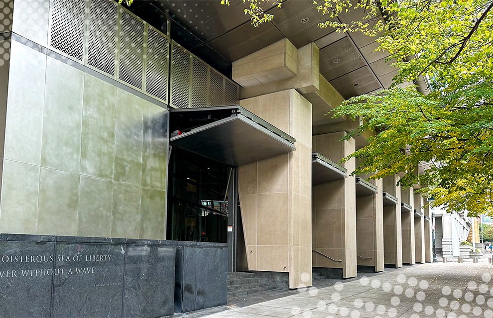 Seven Schweiss security bifold doors installed on Hatfield Courthouse shown open from the left