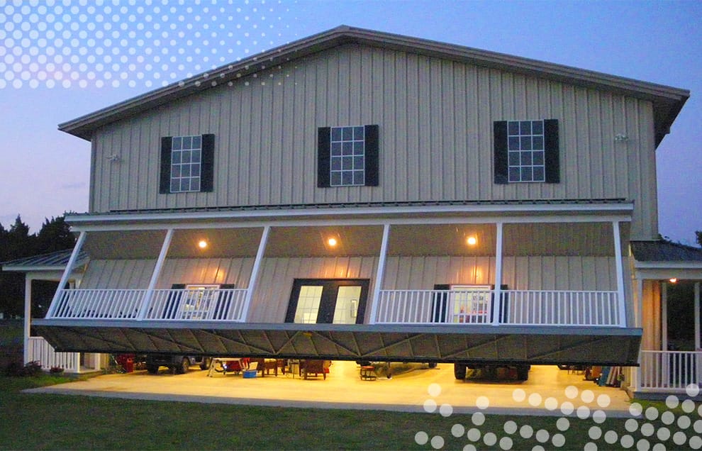 Discrete Schweiss hydraulic door with porch installed on hangar in Florida shown opening