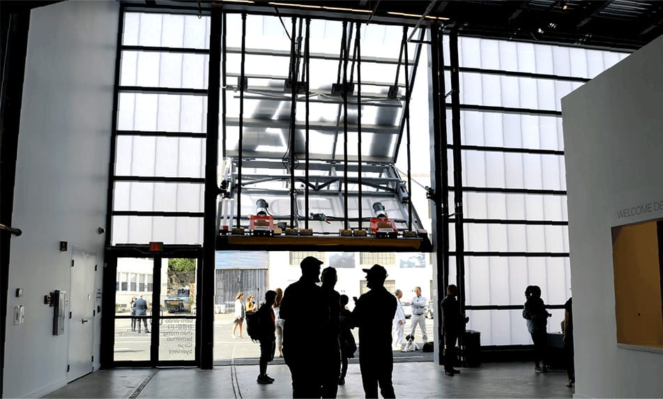 Interior view of custom Schweiss bifold door fitted on water shed at Institute of Contemporary Art