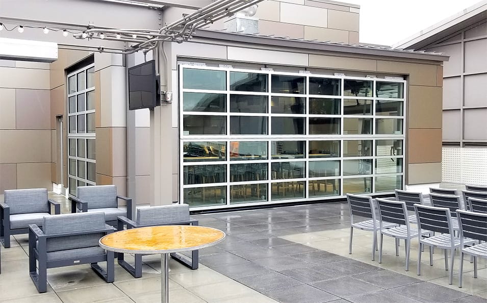 Multiple custom Schweiss glass bifold doors installed at Illinois University shown closed