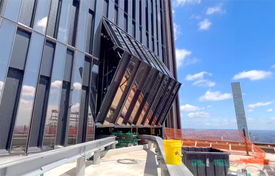 Schweiss bifold door fitted on JP Morgan's 60-story skyscraper headquarters shown opening