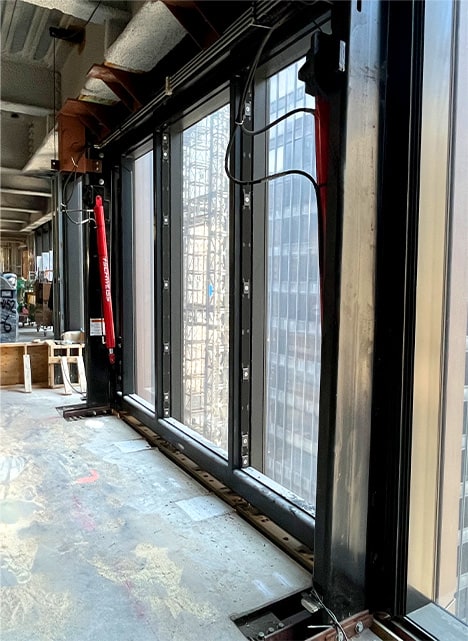 Schweiss hydraulic door fitted on JP Morgan's 60-story skyscraper headquarters shown open