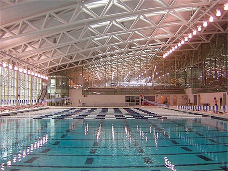 Interior view of Kenyon College's fitness center where a custom Schweiss glass bifold door is installed