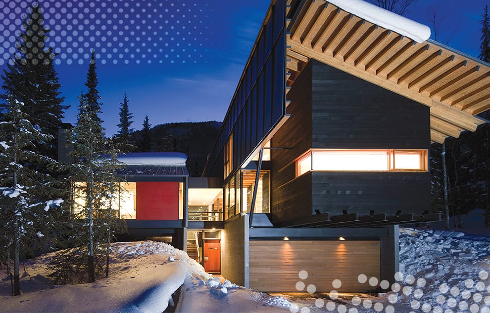 ustom Schweiss hydraulic door with wood cladding fitted on Kicking Horse Ski Resort