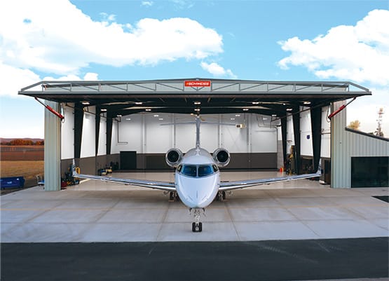 Schweiss hydraulic door on Lanz Hangar viewed from front