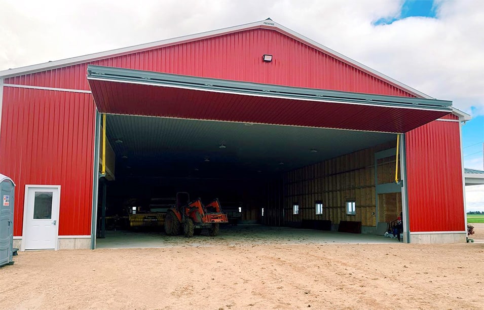 Head-on view of Schweiss bifold door fitted on machine shed at LeifsoLee Farms