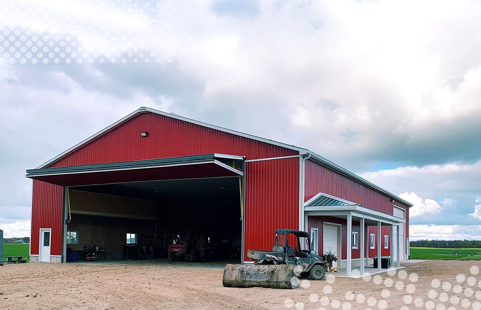 Wide shot of machine shed on LeifsoLee Farms that is fitted with a Schweiss bifold door