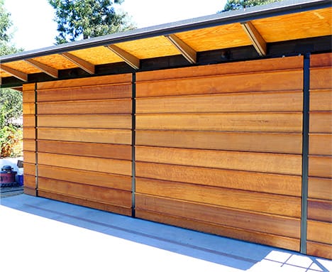 Custom Schweiss bifold door installed on a double garage in Los Altos shown in the closed position