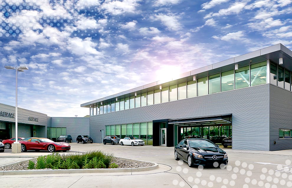 Schweiss glass bifold doors installed on Mercedes-Benz Dealership in St. Louis in the open position