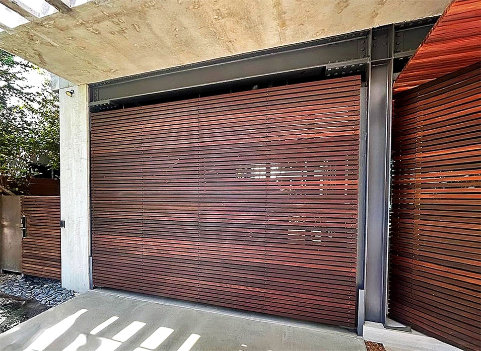 Schweiss bifold designer door fitted on contemporary home in Miami shown closed