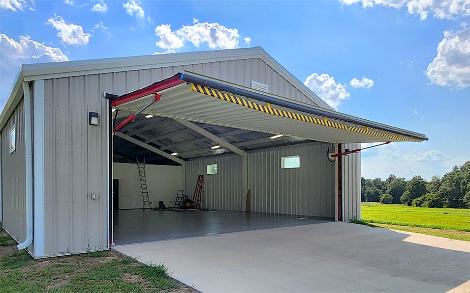 Exterior view of Schweiss hydraulic door installed on Mike McLeod's hangar