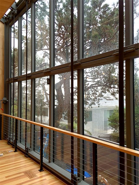 Interior view of Schweiss glass bifold door fitted on a home in California shown closed