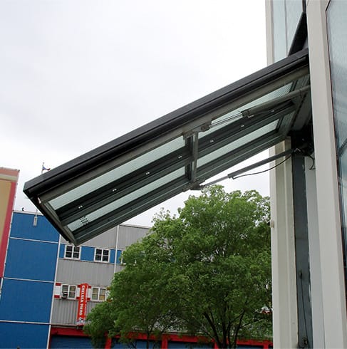 Side view of Schweiss hydraulic door used as a window on a museum in New York City