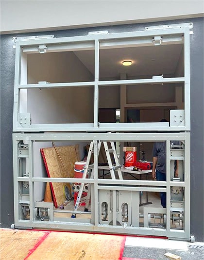 Closeup of Schweiss bifold frame fitted on residence in Puerto Rico