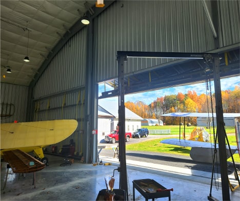 Interior view of Schweiss bifold door fitted on Old Rhinebeck Aerodrome