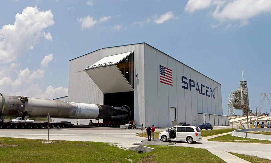 Distanced view of Schweiss bifold door installed on rocket hangar in Cape Canaveral, Florida