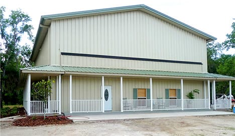 Unique Schweiss hydraulic door with full porch fitted on Shaw hangar home shown closed