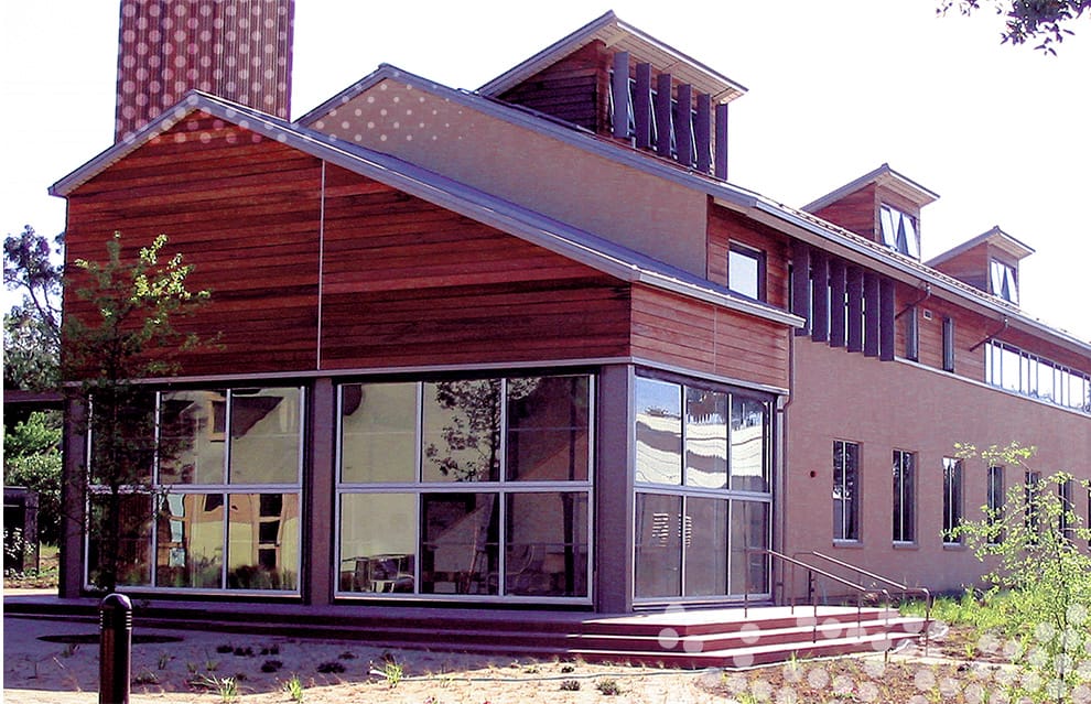Wide view of Schweiss bifold doors installed on Carnegie Institution's Global Ecology Center at Stanford University