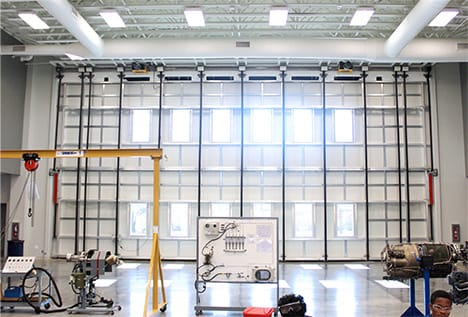 Interior view of Schweiss bifold liftstrap door fitted at Sterling Aviation HS shown closed