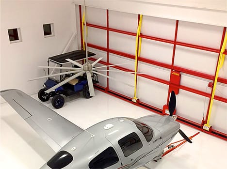 Interior overhead view of Texas Hangar Home fitted with Schweiss bifold door