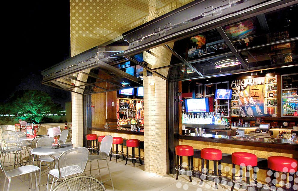 Schweiss bifold doors fitted on a TGI Friday's in Dallas, Texas in the open position
