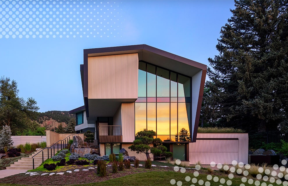 Frontside view of the Vergence House, fitted with a Schweiss bifold door on its garage