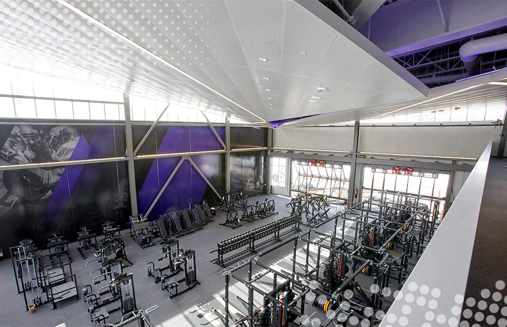Interior view of Vikings Training Center in Eagan, MN with their custom Schweiss glass bifold doors in the background