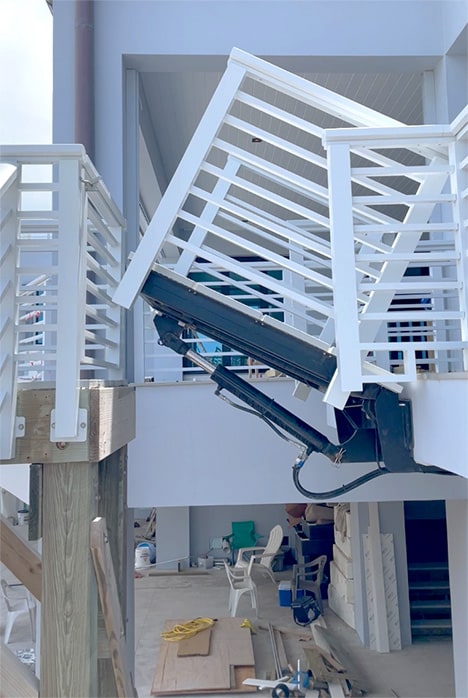 View from side of Schweiss hydraulic man-bridge that was custom built for a customer in Florida shown raising