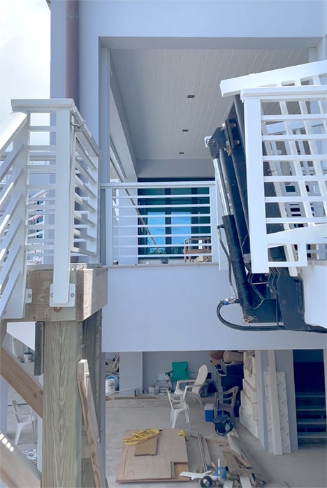 View from side of Schweiss hydraulic man-bridge that was custom built for a customer in Florida shown fully raised