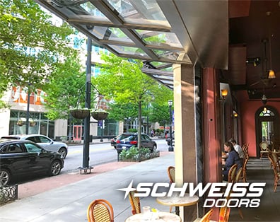 Atlanta, GA's Cafe Intermezzo have hurricane wall pins, manual latching systems and top-drive electric motors