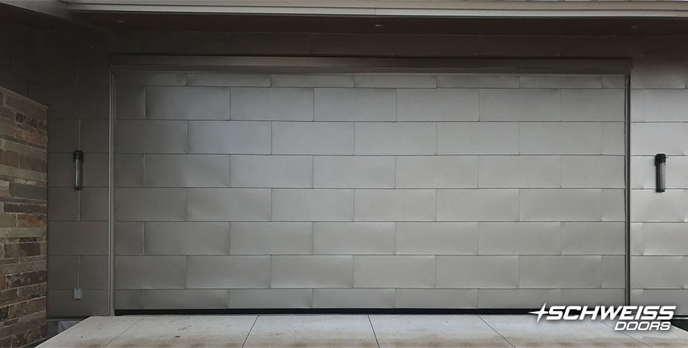 Hydraulic Garage Door clad in Metal panels
