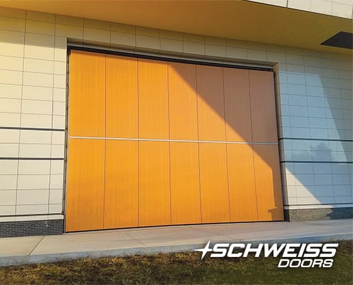 This Bifold Designer Door by Schweiss was specially clad to match the rest of the school