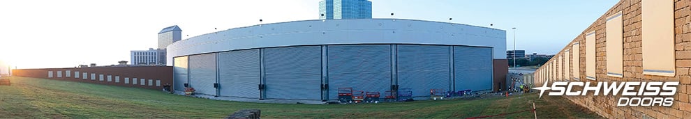 Panoramic View of 7 Schweiss Bifold Liftstrap Arena doors