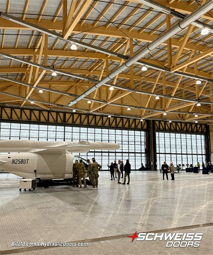 Interior view of 120ft Schweiss hydraulic hangar door behind a plane shown closed