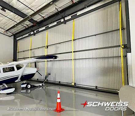 Interior view of Schweiss liftstrap bifold hangar door fitted on Brad Mottier's hangar shown closed