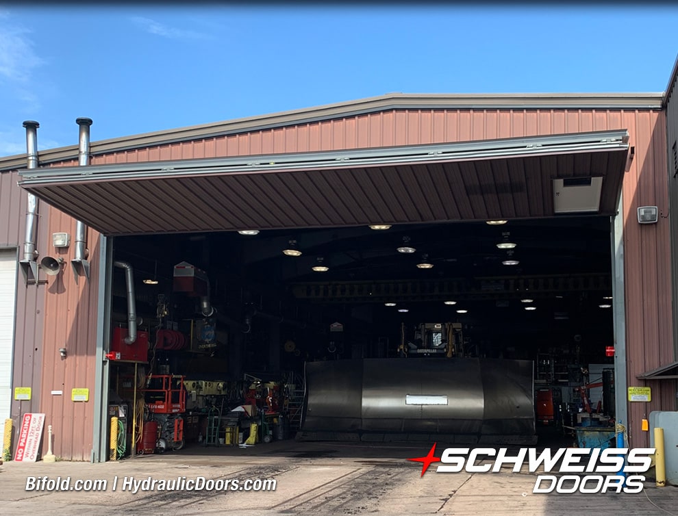View from front of Schweiss bifold machine shed door fitted on Midwest Energy Resources building shown open