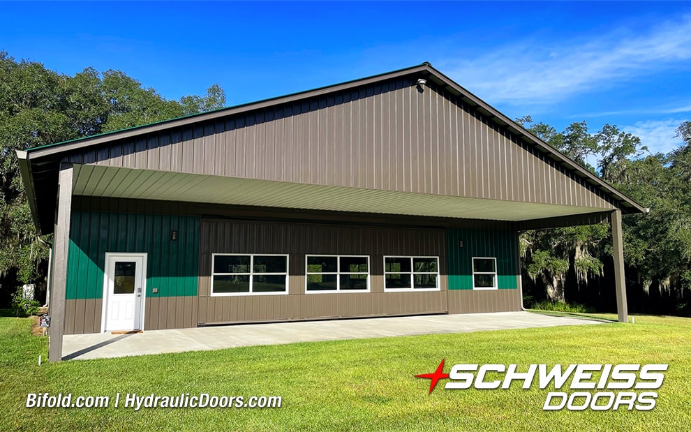 Exterior view of Schweiss hydraulic door installed on Moore Car Barn shown closed
