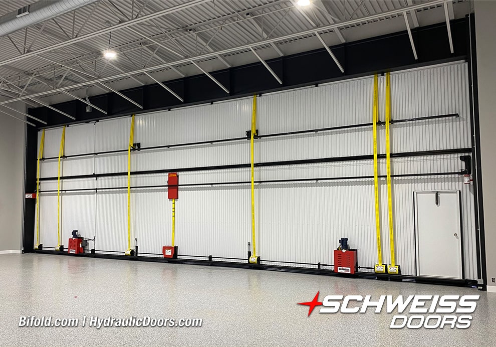 Interior view of Schweiss liftstrap bifold hangar door installed by Rob Evans on hangar shown closed