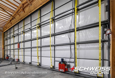 Interior view of Schweiss bifold hangar door installed on Roche Harbor hangar shown closed