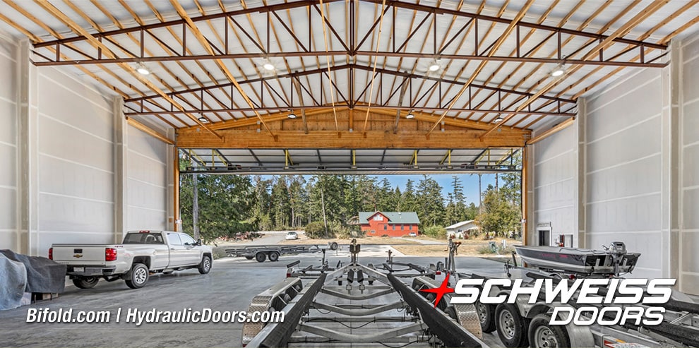 Interior view of Schweiss bifold hangar door installed on Roche Harbor hangar shown open