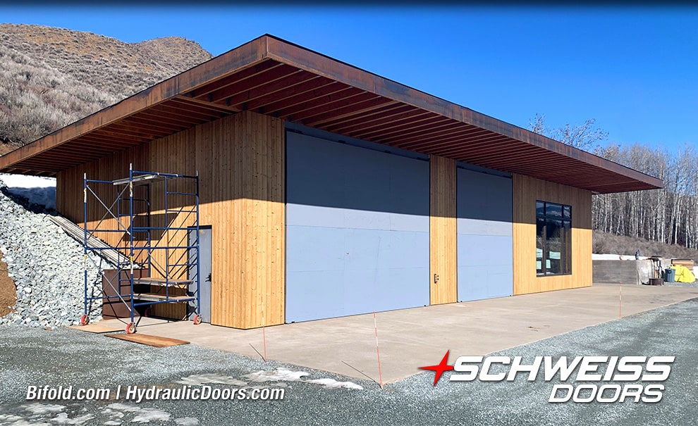 Schweiss bifold doors fitted on Roger Bown's building shown closed from outside