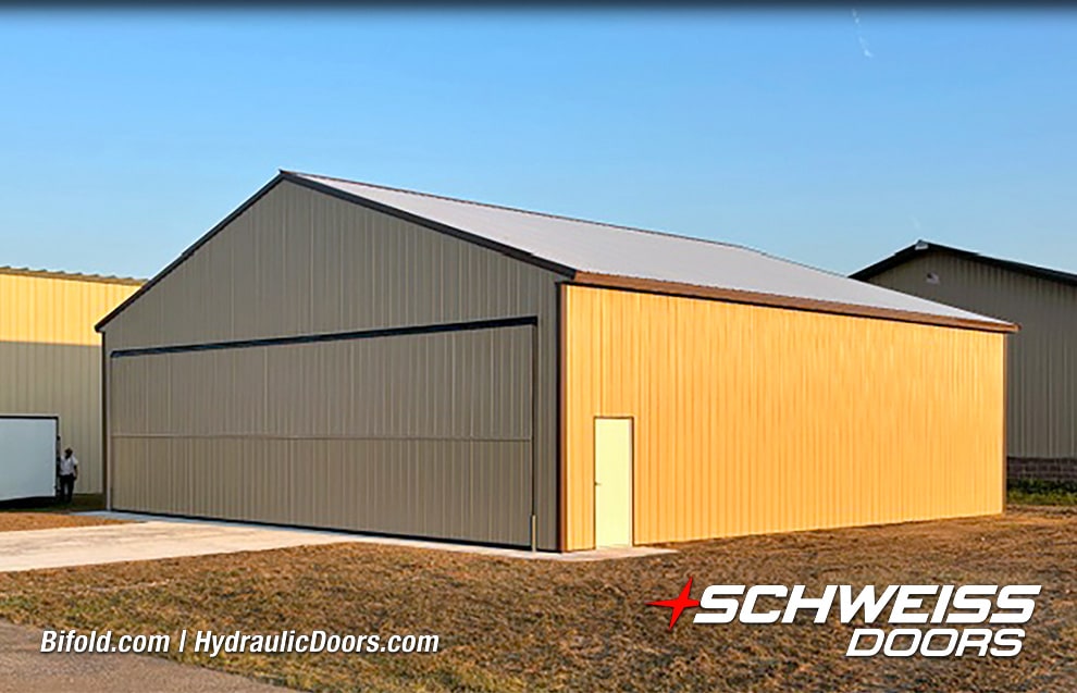 Exterior view of Schweiss bifold hangar door fitted on Steve Allen's hangar
