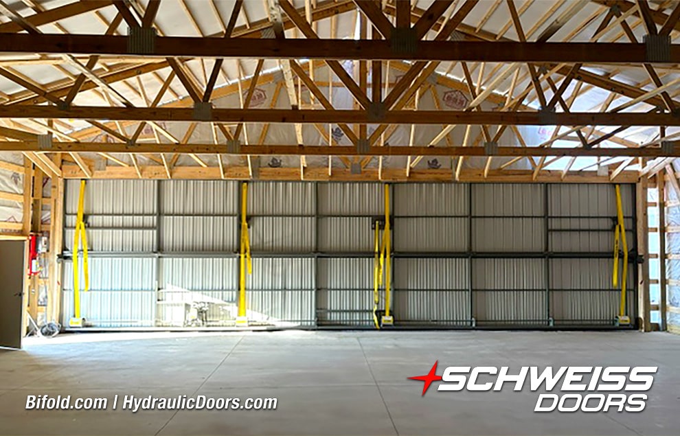 Interior view of Schweiss bifold hangar door installed on Steve Allen's hangar