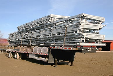 Schweiss door loaded on a trailer ready to be attached to a semi and delivered