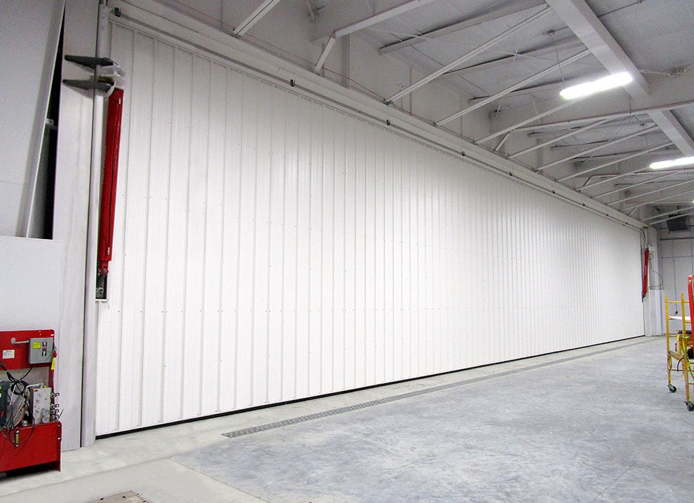 Interior view of a closed Schweiss hydraulic door fitted on a hangar